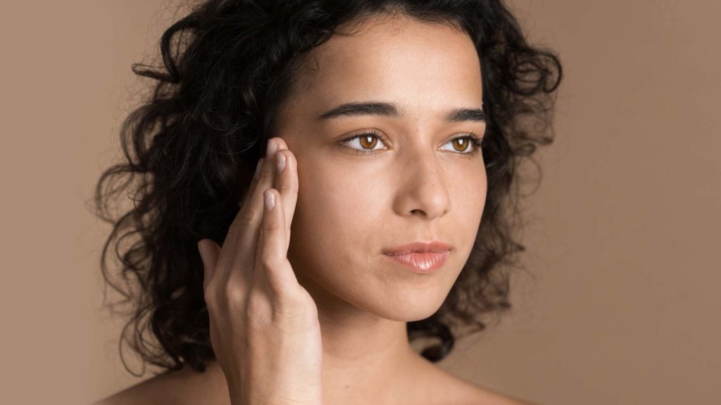 What causes dull and uneven skin tone?  